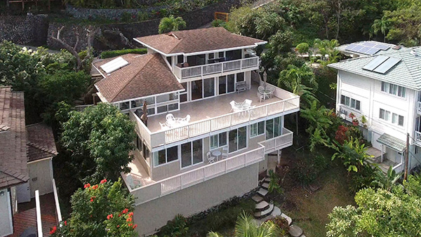 Lanikai hillside home with fabulous turquoise ocean and Mokulua Island views. Property video made to sell and showcase your home.